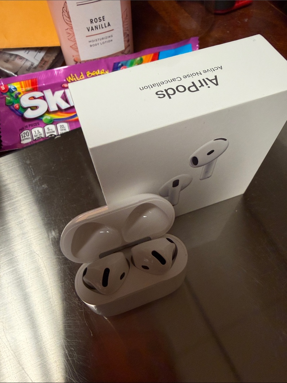 Apple White AirPods 4th generation with active noise cancellation. Fairly new